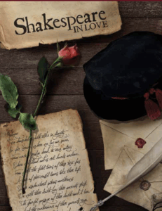 there is a black hat and a red rose on a table